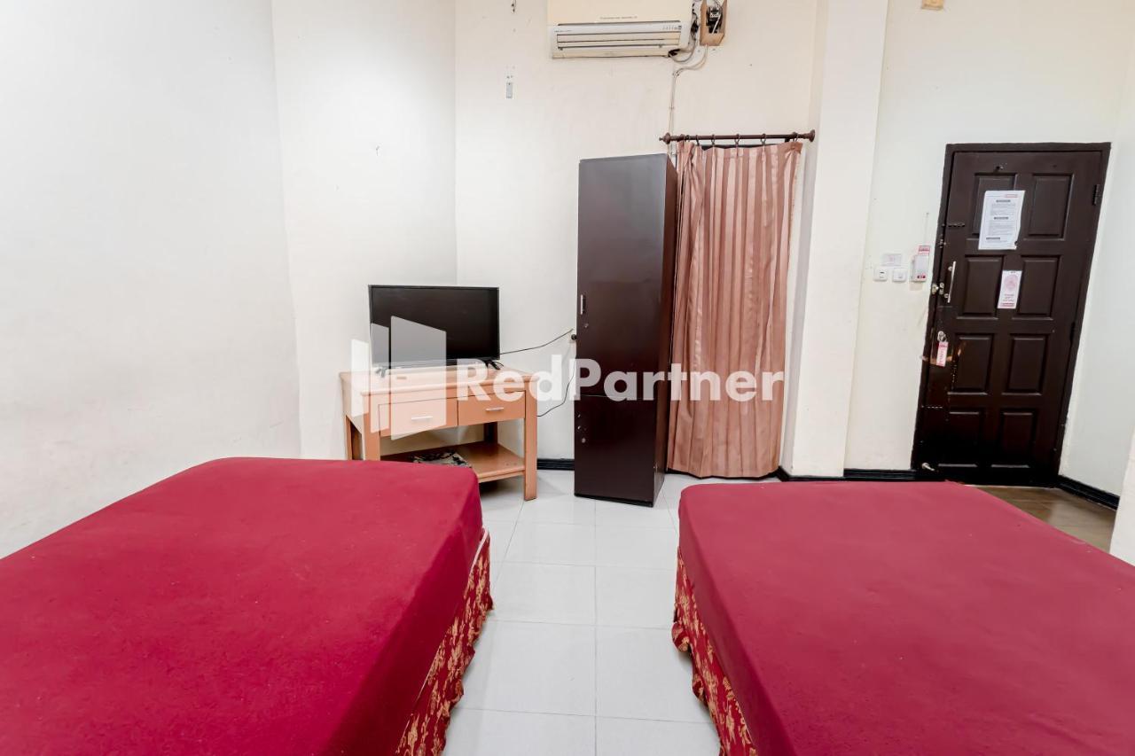 Cherry Pink Hotel Medan Mitra Reddoorz Extérieur photo