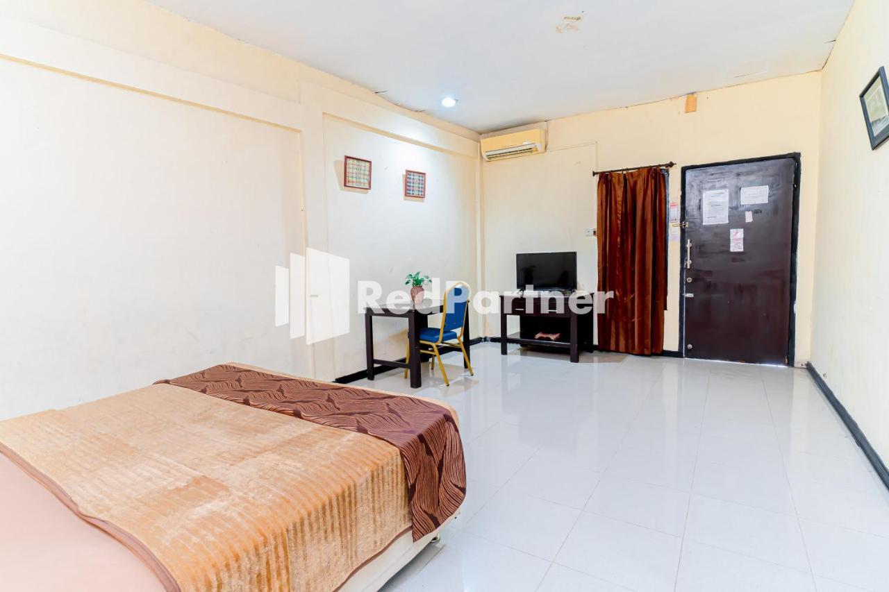 Cherry Pink Hotel Medan Mitra Reddoorz Extérieur photo