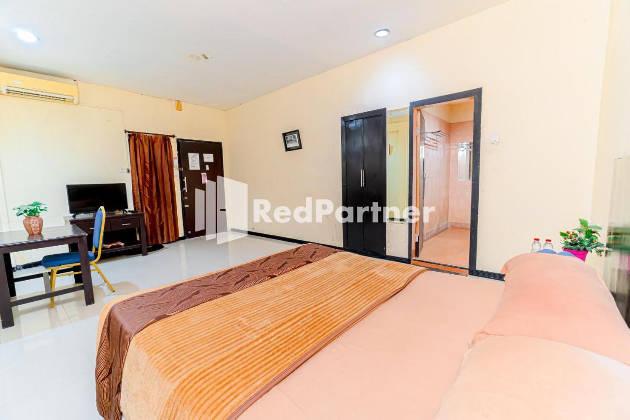 Cherry Pink Hotel Medan Mitra Reddoorz Extérieur photo
